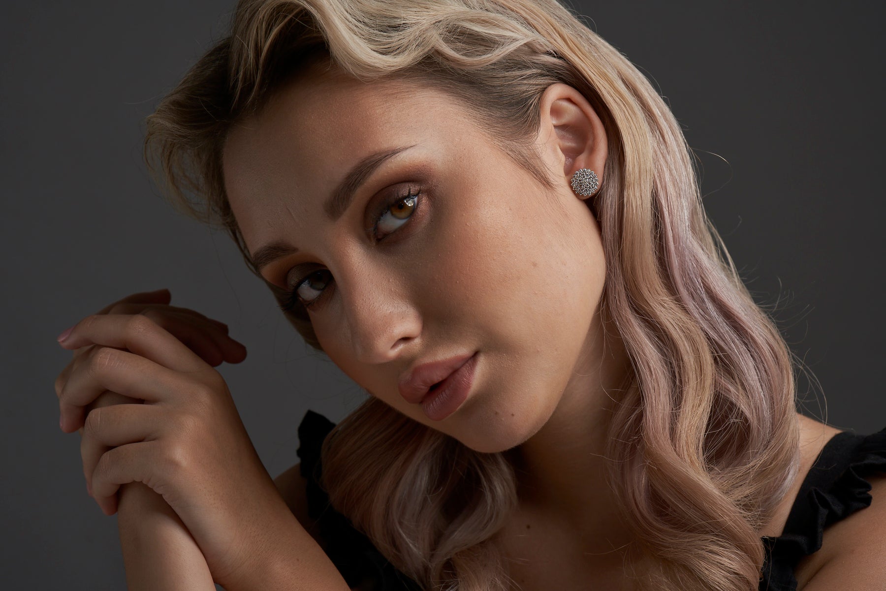 girl with circle diamond earrings